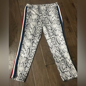 Pam & Gela Snakskin print Small Pants. Side stripes. zipper ankle